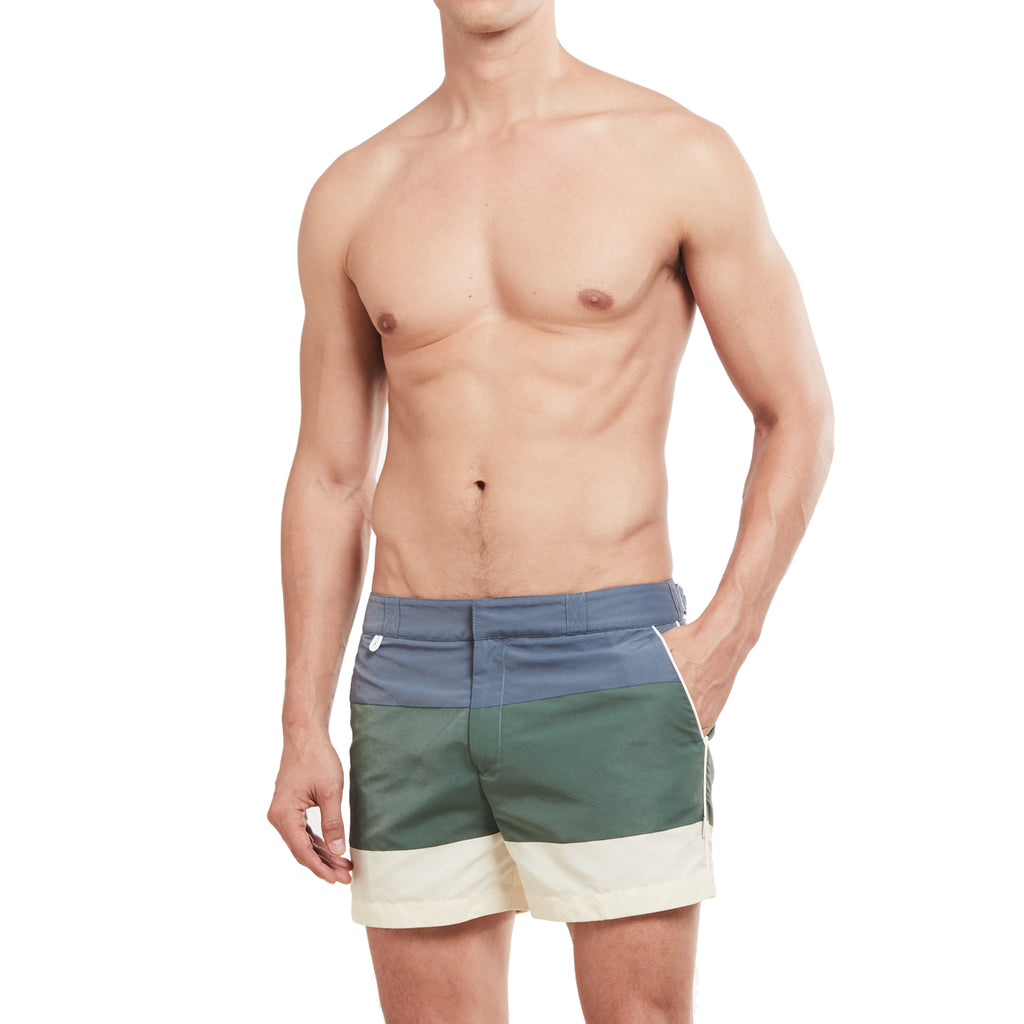 Blue, green, and white bathing trunks